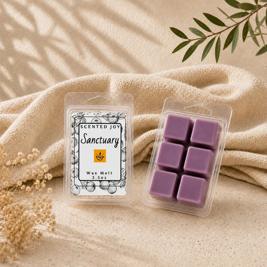 Purple Scented Joy Sanctuary wax melt cubes on a textured beige fabric backdrop.