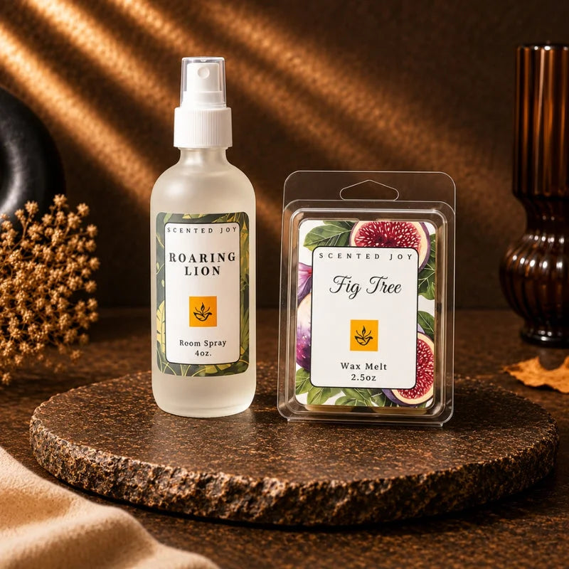 Scented Joy Roaring Lion room spray and Fig Tree wax melt on a textured stone tray